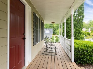 Gracious covered porch, perfect for your porch swi