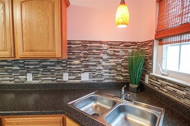 New lighting and glass tile back splash.