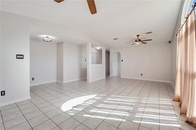 Formal living and dining areas with view towards b