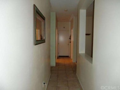Hallway leading to the 3rd bathroom on the right, 