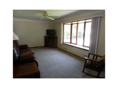 Living Room. Beautiful bay window lets in lots of 