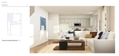Living area featuring light wood-style flooring and baseboards
