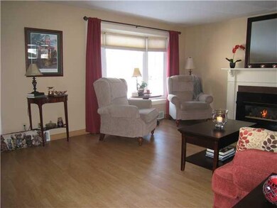 Living Room. Bay window lets in lots of natural li