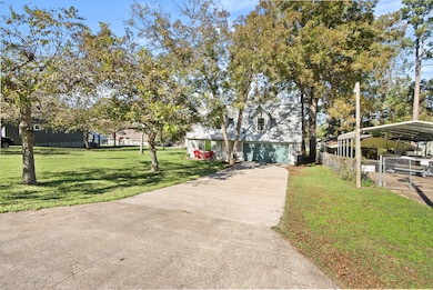 House sits on 1.5 lots. Has a large side yard.