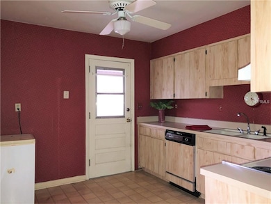 Kitchen - Backdoor Leads to Carport