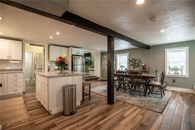 White kitchen with stylish subway tile backsplash,
