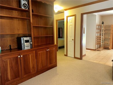 Cherry bookcase matches kitchen cabinets