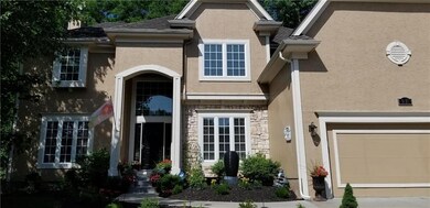 WELL MAINTAINED HOME WITH LOTS OF LANDSCAPING AND 