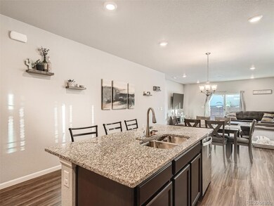 Kitchen leading opens to dining area and great roo
