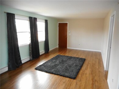 Common area on second floor with two bedrooms and 