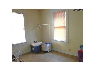Another bedroom has laminate flooring