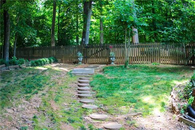 Stepping Stone Path from the Driveway to Fenced Back Yard