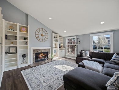 Living Room w/ recessed lighting & fireplace