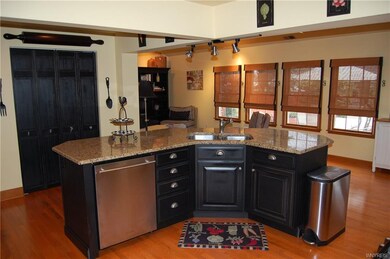 Island with additional storage, sink, stainless st