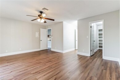 Unfurnished room with wood-type flooring and ceili