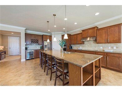 The gourmet kitchen has upgraded stainless built-i