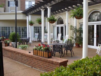 Patio over looks the lovely pool.
