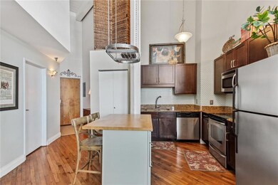 The kitchen with view back to the front door - the