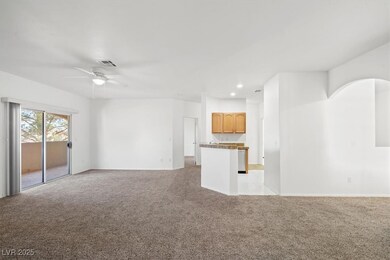 Unfurnished living room with ceiling fan, recessed