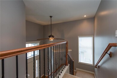 VIEW FROM BEDROOM LEVEL LOOKING DOWN THE CUSTOM CU
