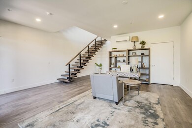 Office w/ storage, half bath and garage