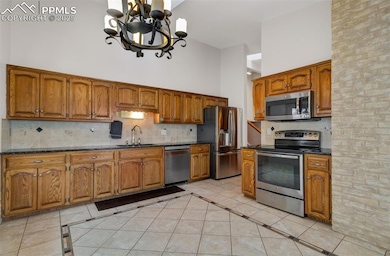Kitchen with stainless steel appliances, granite c