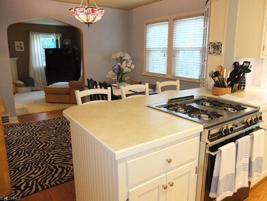 Another view of the kitchen, dinette and living ro