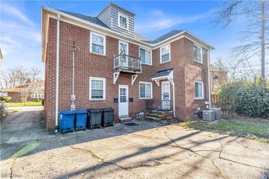 Townhome / multi-family property featuring a balcony and central AC