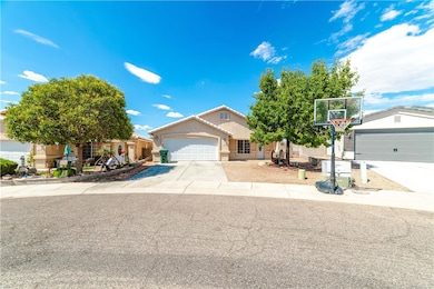 View of front of home featuring concrete driveway,