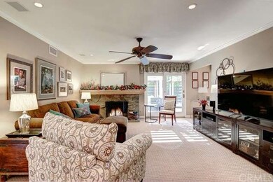 View of living room from Front Doors, cozy fire & 