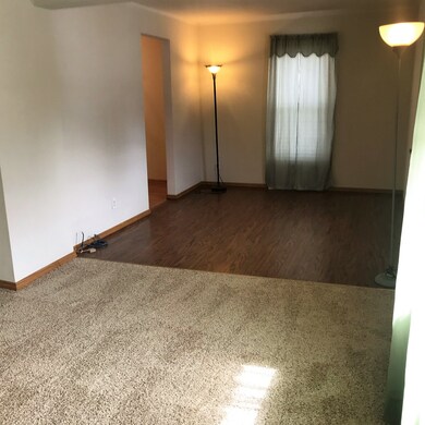 New flooring, fresh paint includes window treatmen