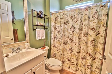 The hallway bathroom is accessible to the bedrooms