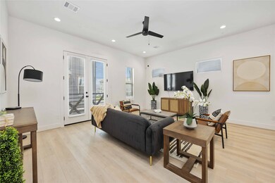 Living area. Photo of the model home. Finishes & s