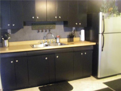 Kitchen. Tons of cabinets in this kitchen