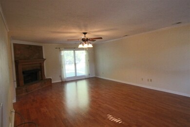 HUGE den. 27 x 16. With a cozy gas fireplace in th