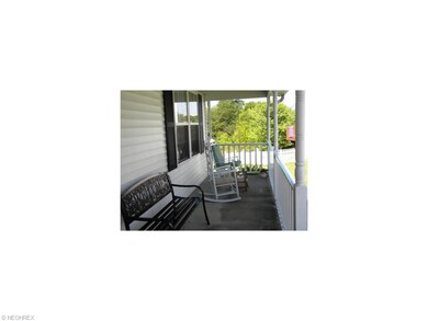 Relax and enjoy visiting with neighbors on your fr