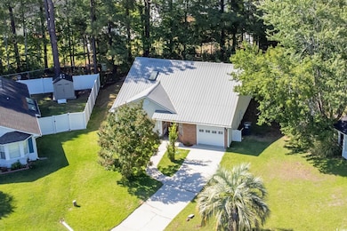 Aerial view of property and surrounding area