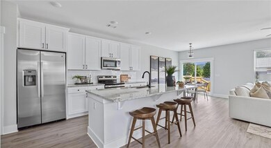 Kitchen with appliances with stainless steel finis