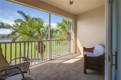 Sunroom featuring a water view and ceiling fan