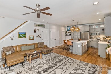 There is no shortage of natural light in the main level living area.