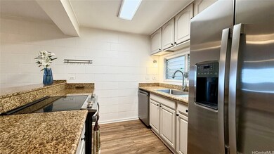 Galley Kitchen With Newer Appliances