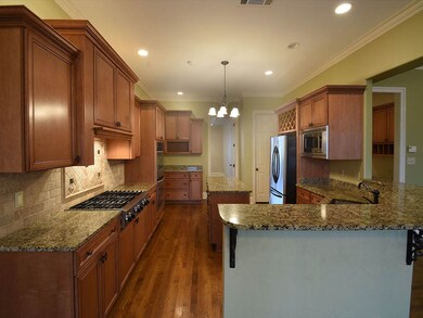 Granite,stainless appliances,6-burner gas cooktop,