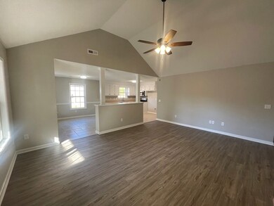 Greatroom with Cathedral ceilings and LVP flooring