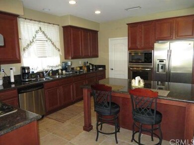 Stainless steel appliances with granite countertop