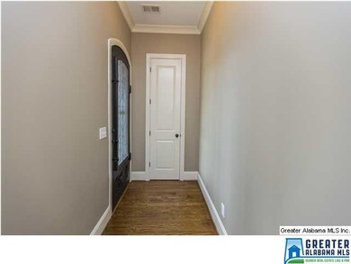 FOYER  WITH COAT CLOSET AND BEAUTIFUL HARDWOOD FLO