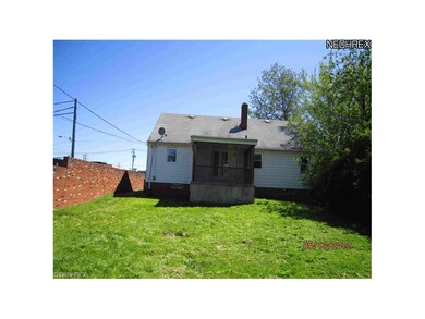 Rear Yard w/screened in porch.