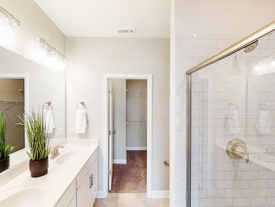 This is a photo of one of our model homes. Please know that some of the exterior and interior finishes, paint, and amenities may vary.