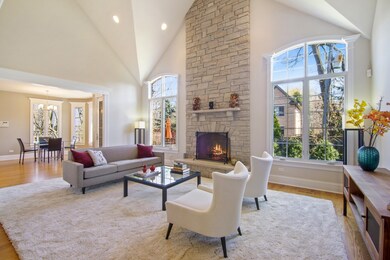 Dramatic vaulted ceiling, 2-story stone fireplace,