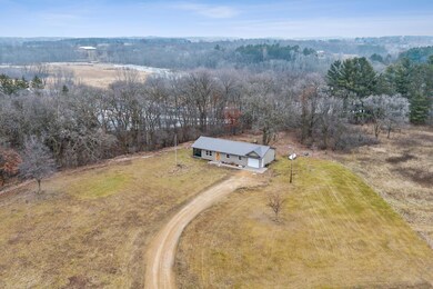 Aerial view of home with the Apple River in the background.