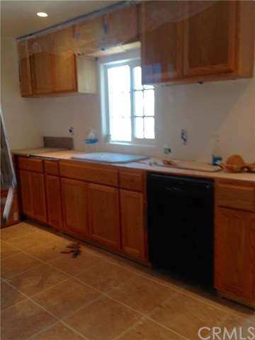 Kitchen isn't quite finished, but has ceramic floo